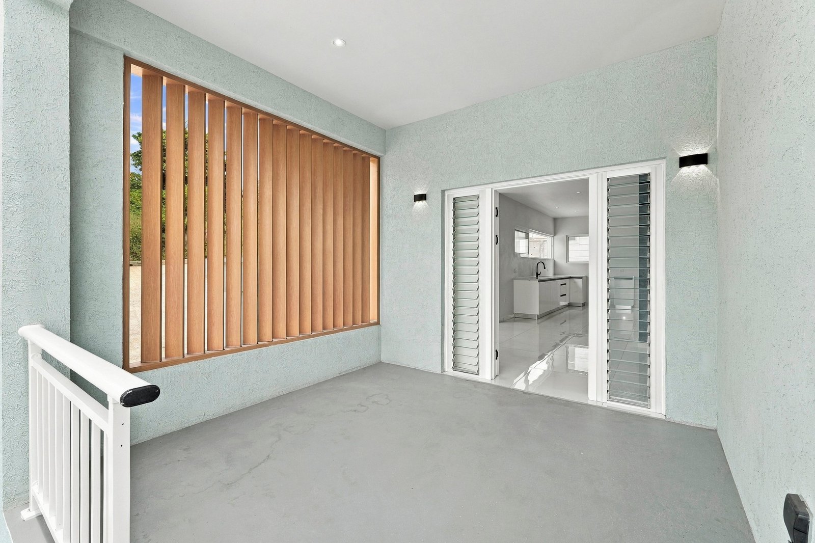 Bayleaf design, Lot 123: covered entry porch with a slatted screen and doorway.