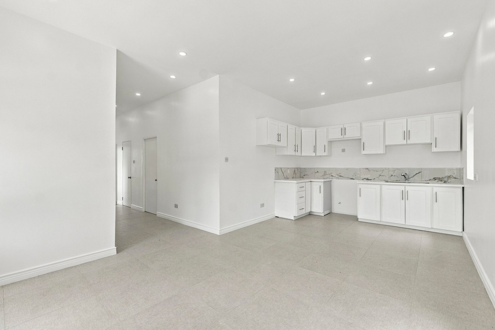 Sapodilla interior showing the living and kitchen spaces.