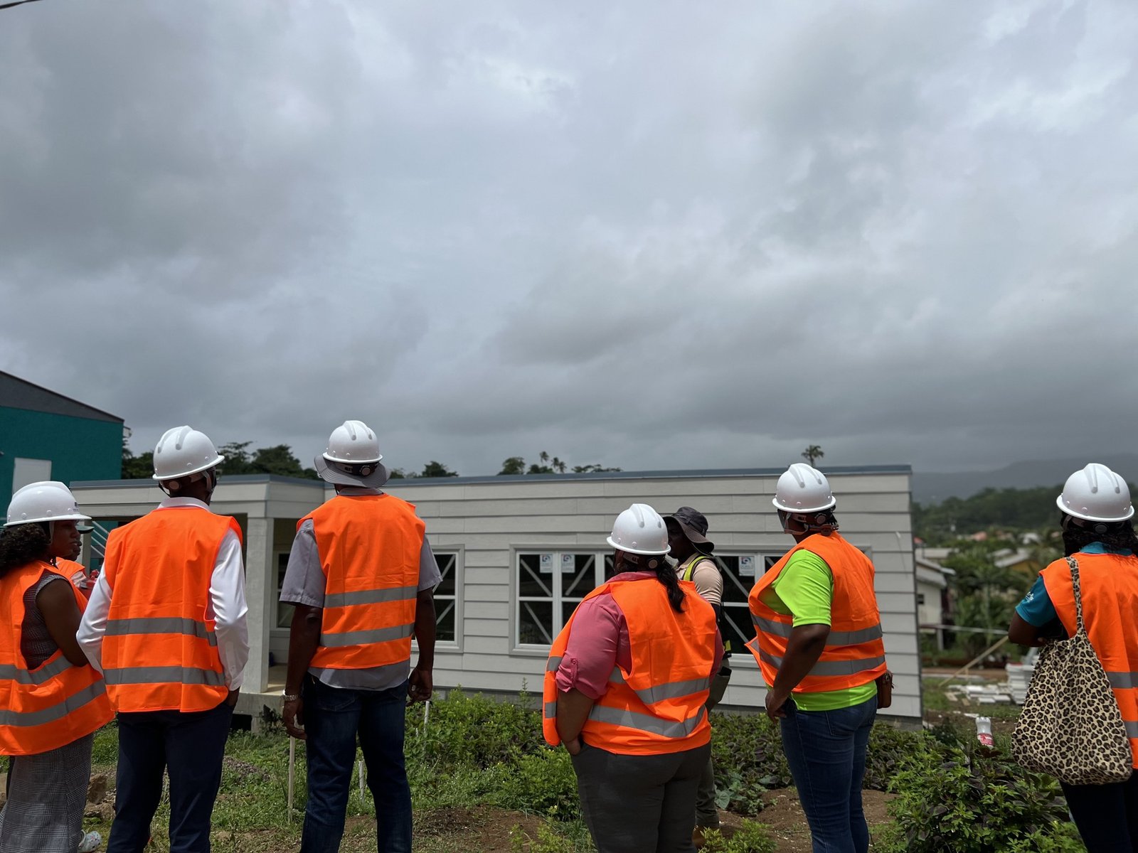 Valuators and contractors walk through the Dunfermline site.